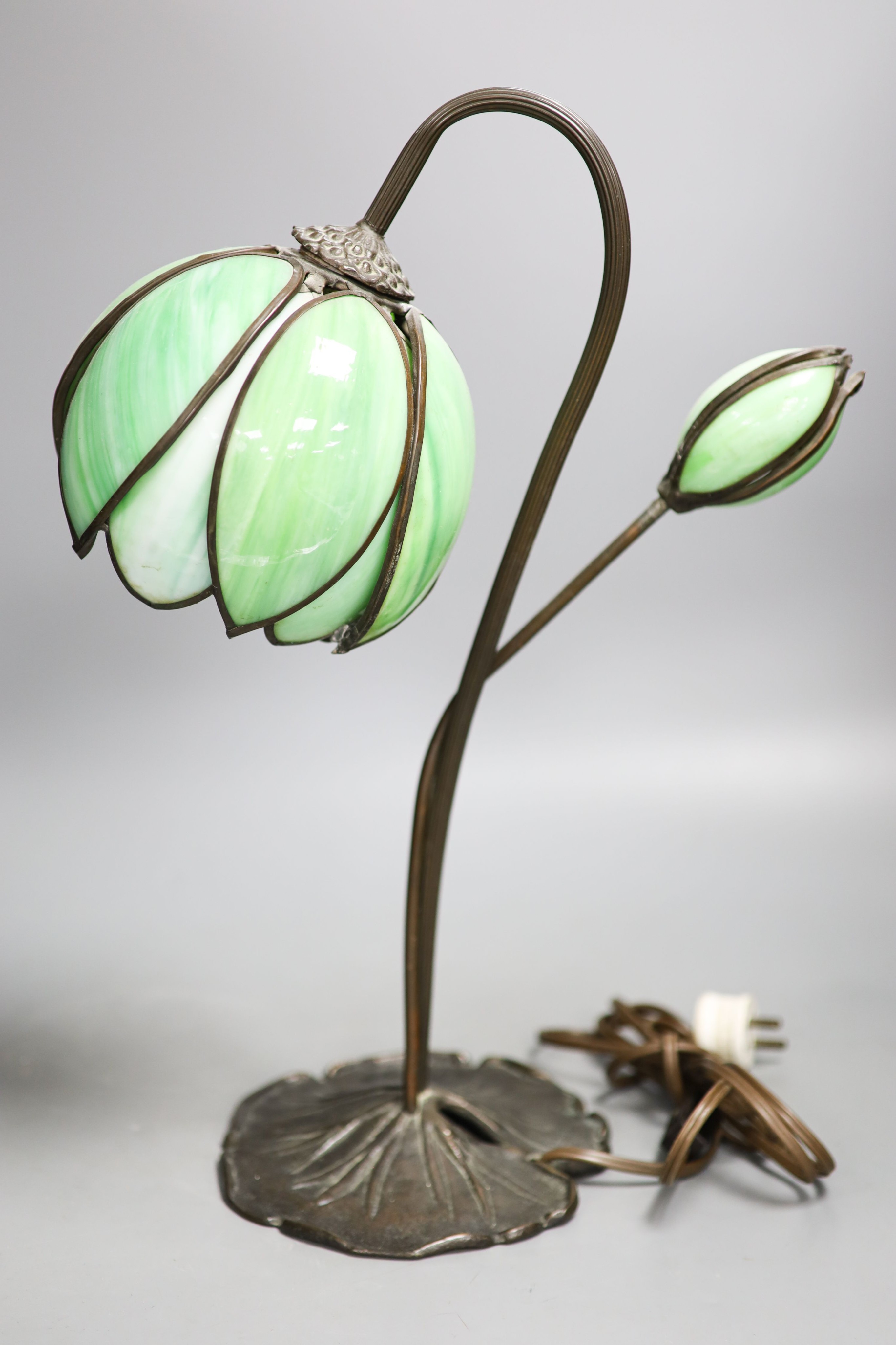 A Tiffany style metal and glass lamp 43cm